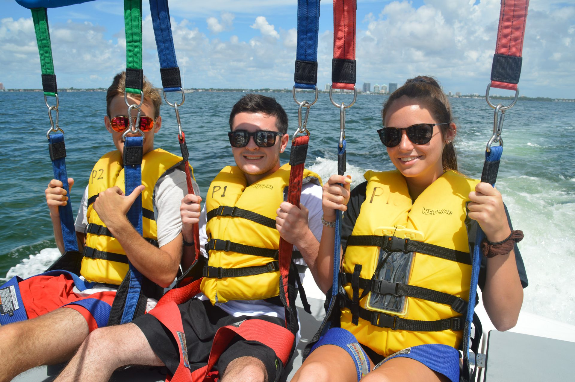 Friends Parasailing a fun thing to do in Miami and Miami beach