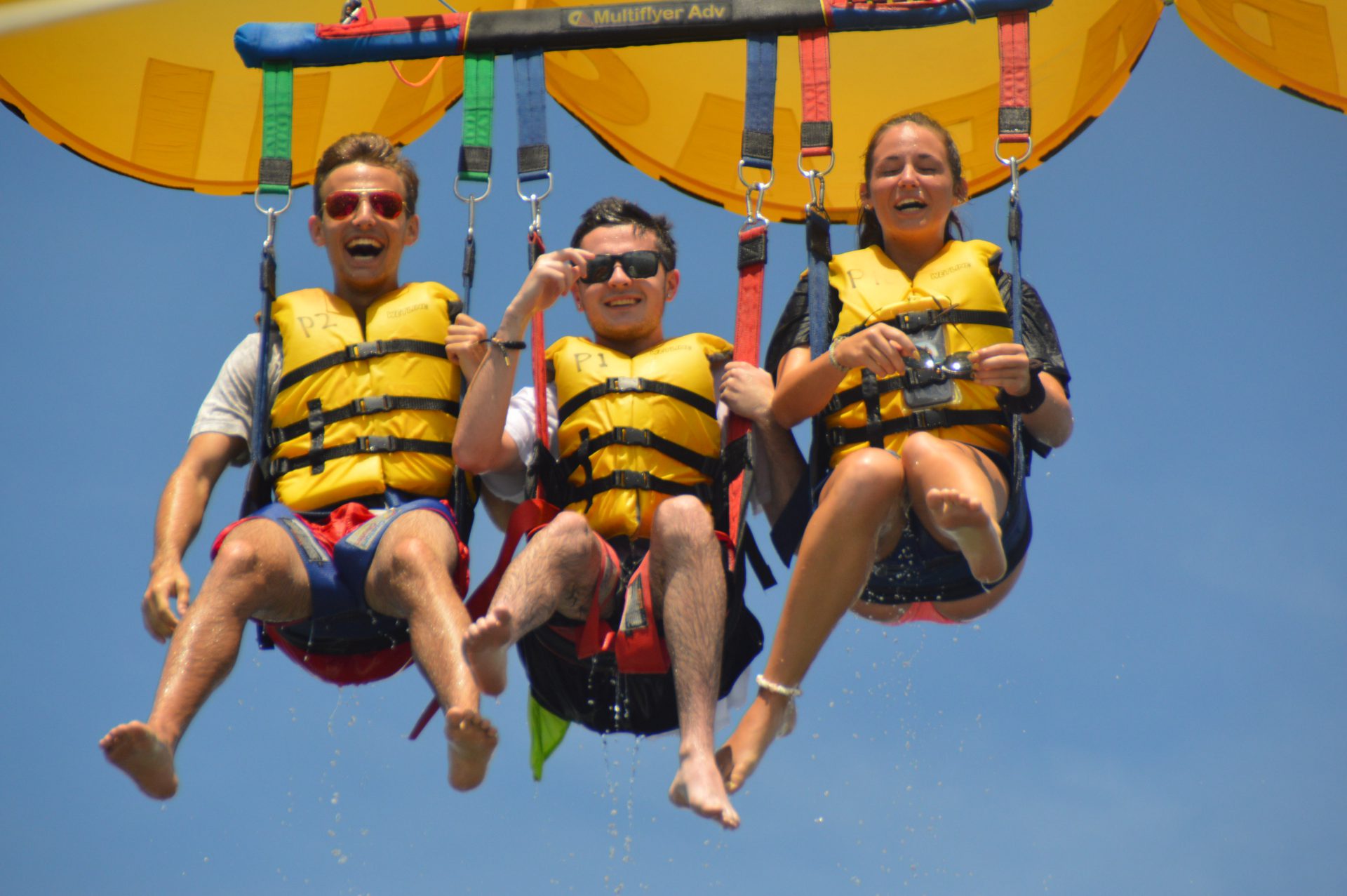 Family smiling during Parasail Ride in Miami