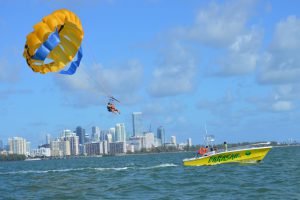 Friends Parasailing a fun thing to do in Miami and Miami beach